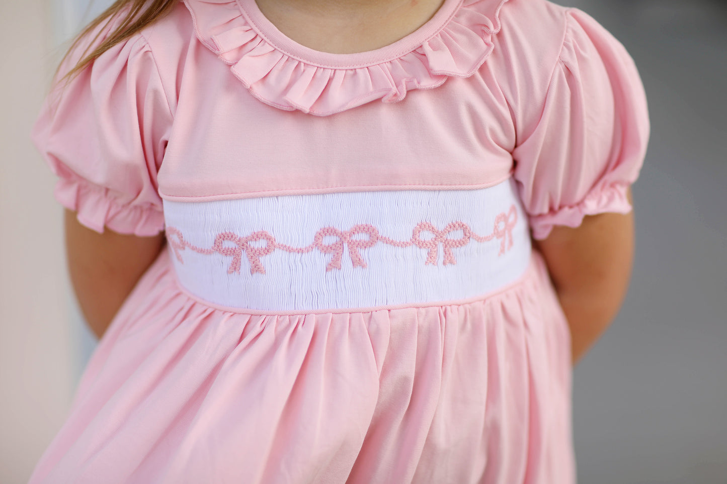 Bow Smocked Pink Knit Ruffle Dress