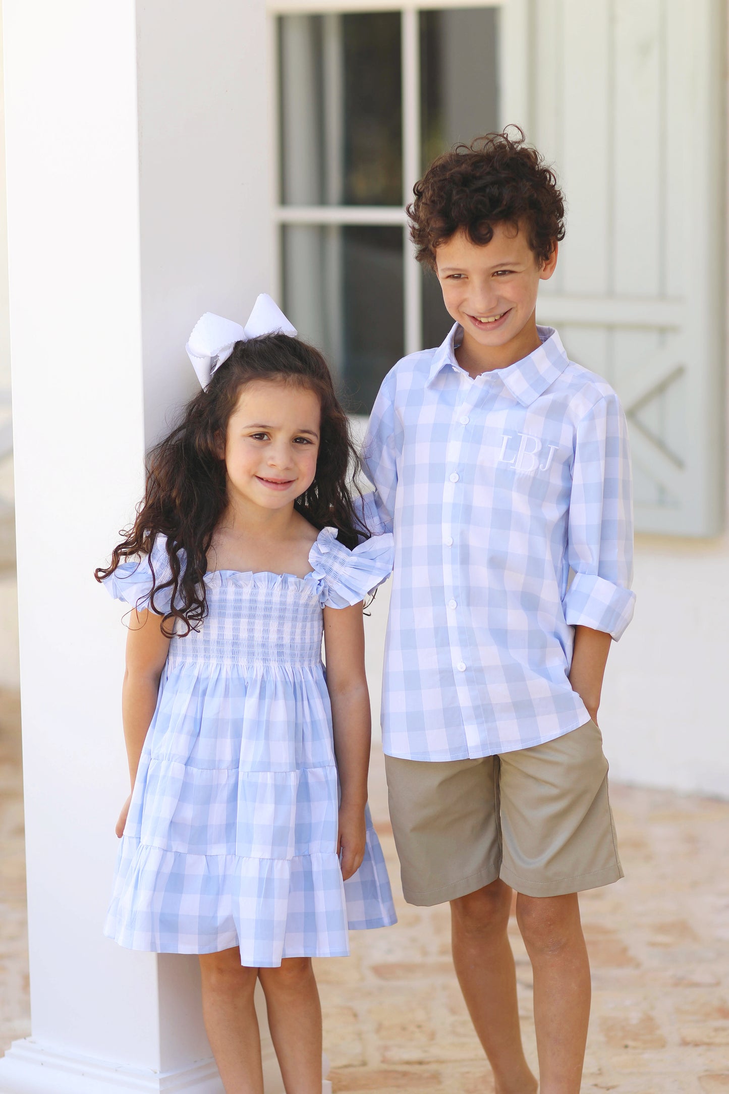 Load image into Gallery viewer, Blue Buffalo Check Smocked Girl Dress
