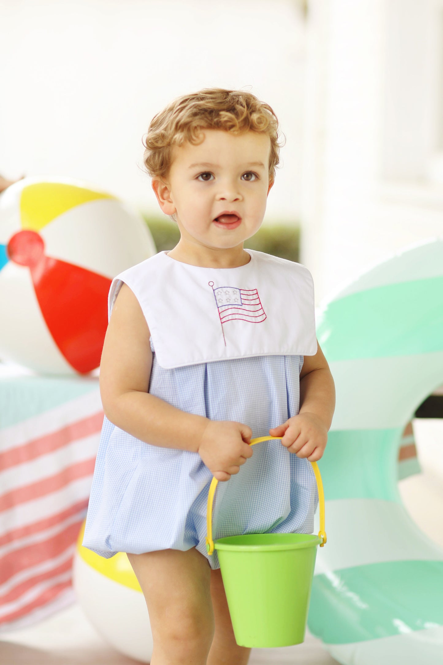 Load image into Gallery viewer, Flag Embroidered Blue Gingham Bib Bubble
