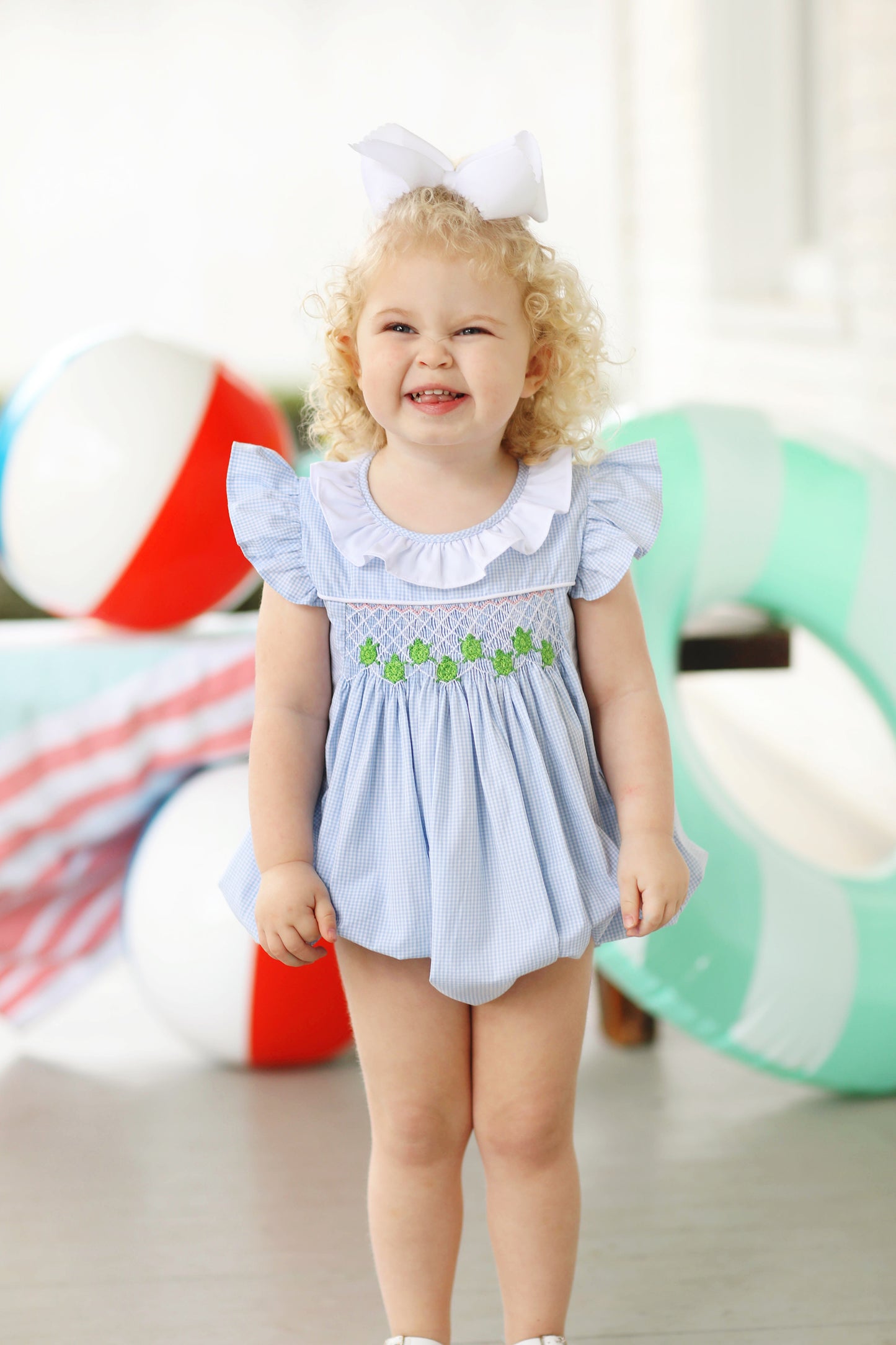 Load image into Gallery viewer, Turtle Smocked Blue Gingham Angel Wing Ruffle Bubble
